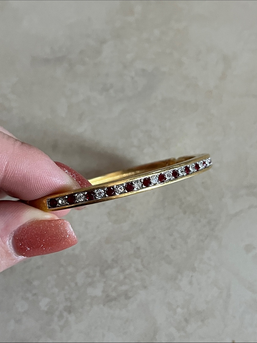 Gold-Tone Bangle Bracelet with Red and Clear Stones